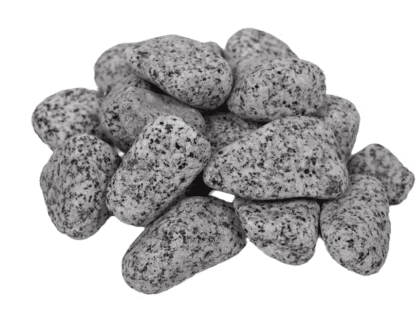 Smooth grey granite pebbles with natural black speckles, piled against a white background for landscaping and garden design.