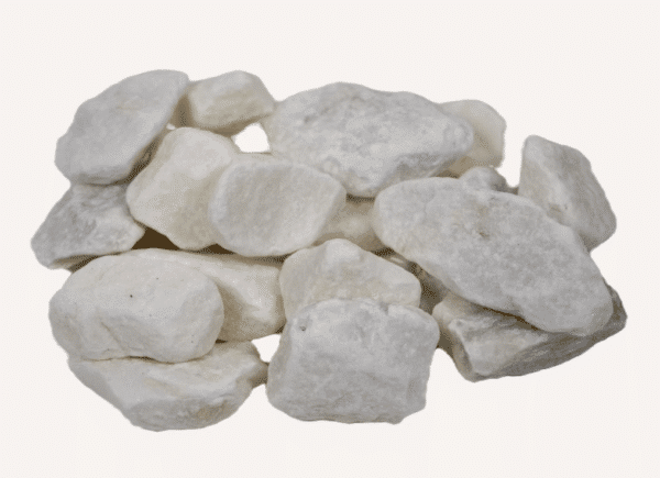 White decorative landscaping stones by Chesshir Stone in Texas, natural pebbles for gardens and outdoor design.
